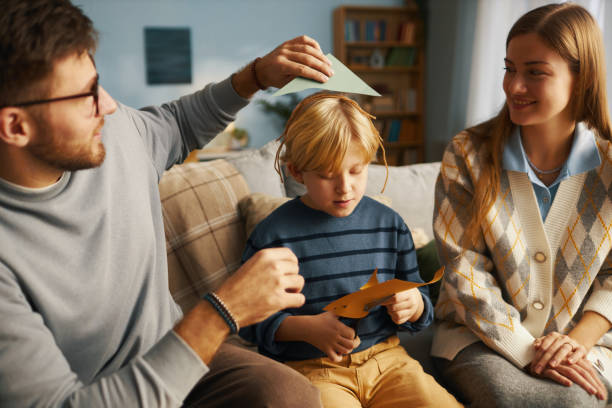 istock Family Enjoying Quality Time Crafting Paper Art 2201045296