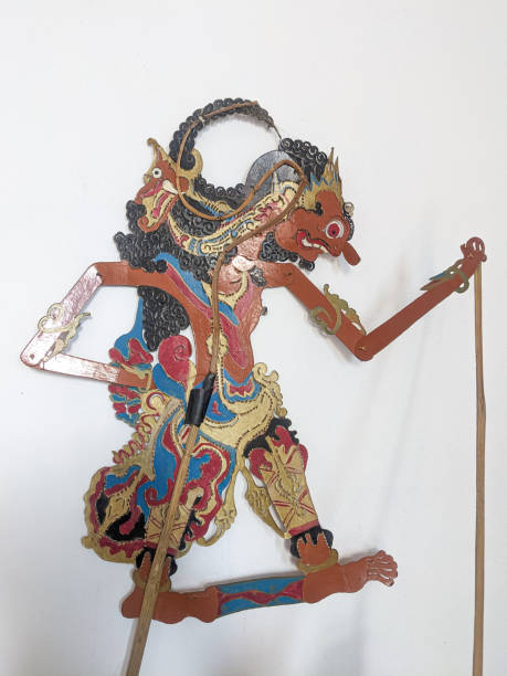 istock A detailed Indonesian wayang puppet against a white background 2201048282