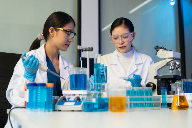 istock experiments containing chemical liquid in laboratory on glassware, innovative and technology. 2201051126