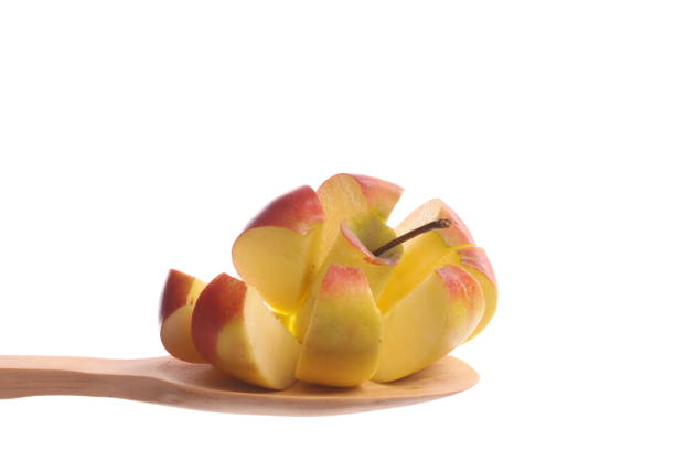 A woman cutting fruits