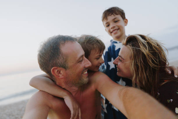 istock Family selfie at the beach 2201055691