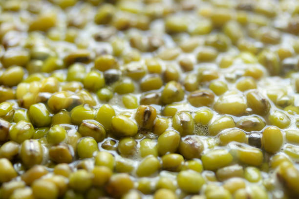 istock Boiled mung bean in the water. Close-up 2201062040
