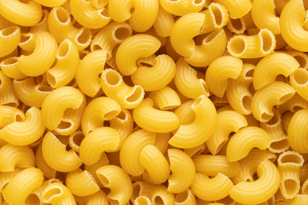 istock Top view of raw macaroni background 2201062072
