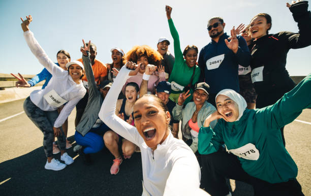 istock Group of friends taking a selfie at pre-race gathering 2201066622