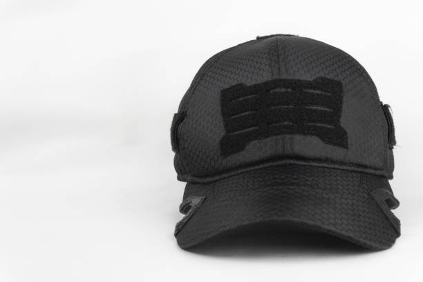 istock Front-facing view of a black tactical cap on a white background, highlighting its design and material. 2201066641