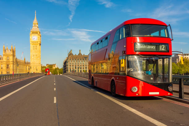 istock Red double-decker bus on Westminster bridge and Big Ben tower, London, UK 2201066958