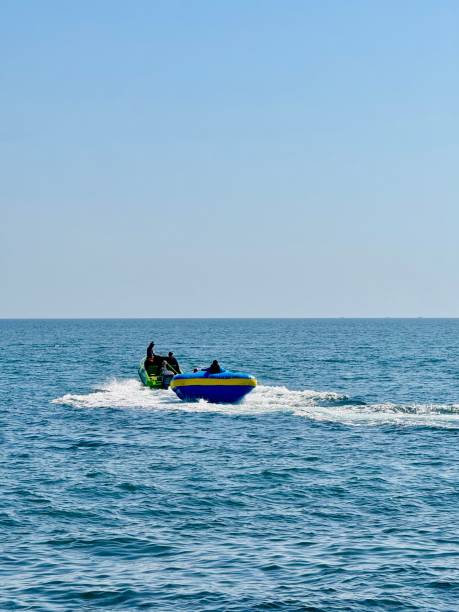 istock Inflatable Boat Ride on Calm Sea. Capture from Utama Raya Situbondo 2201070323