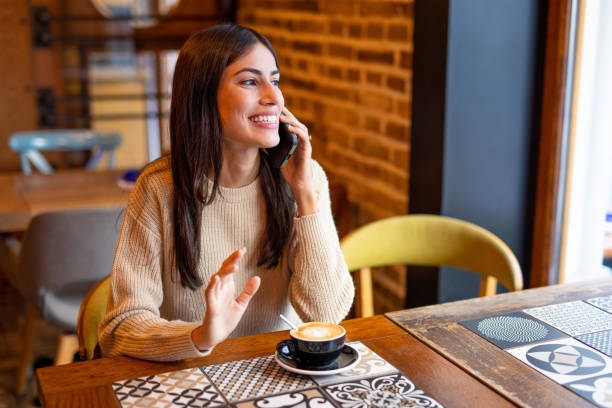 istock Woman talking on the phone 2201084342