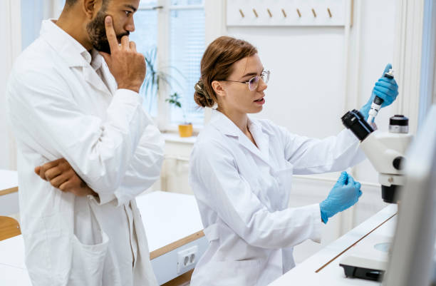 istock Focused STEM Students Conducting Laboratory Experiment in University Classroom 2201085766