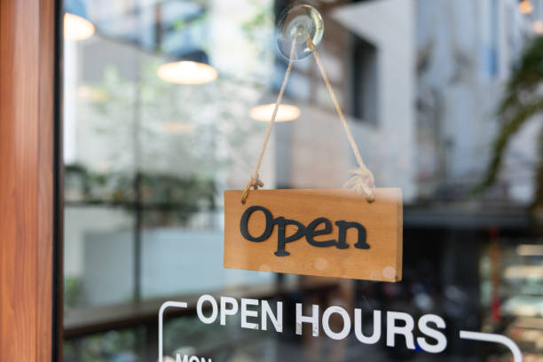 istock A sign hanging from a window that says 