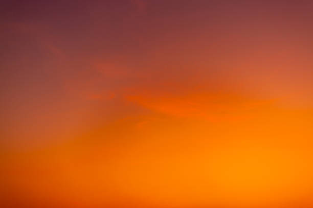 Orange sky background,Beautiful of luxury soft gradient orange gold clouds and sunlight on the blue sky perfect for the background, take in everning,Twilight