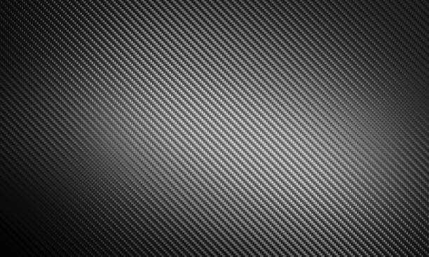 istock Seamless carbon fiber texture creates a dark and elegant background 2201098567