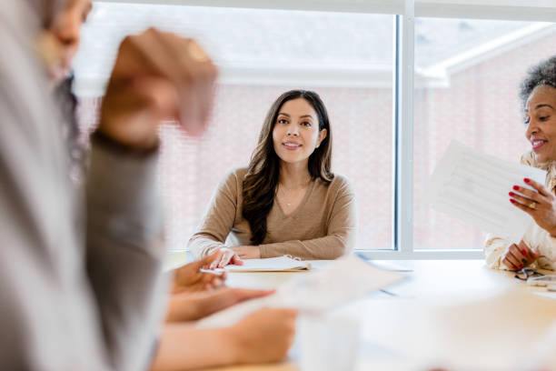 istock Diverse Women in a Business Meeting, Discussing Ideas 2201100612