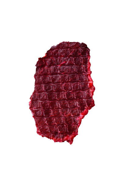 istock Dried beef slices, jerky, with cherry or plum flavor, salt and spices 2201100967