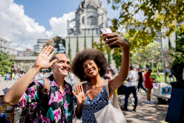 Young couple taking a selfie in Medellin, Colombia