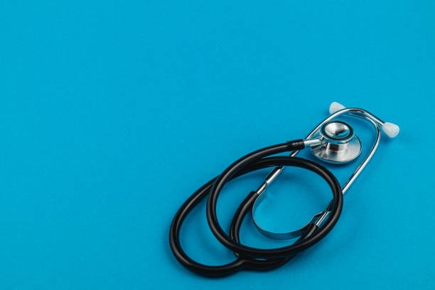 istock Stethoscope on solid blue background representing healthcare awareness efforts 2201103225