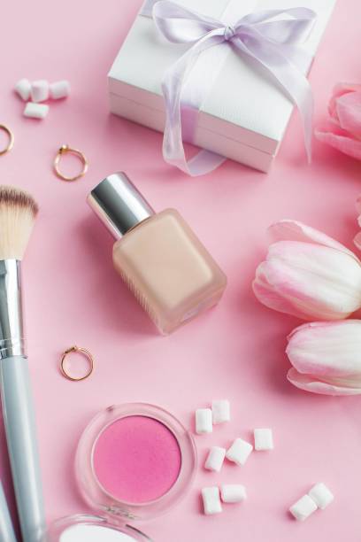 istock Cosmetics, decorations, a bouquet of tulips on a pink background. Gift. A box with a gift. International Women's Day. Holidays. Spring. 2201106943