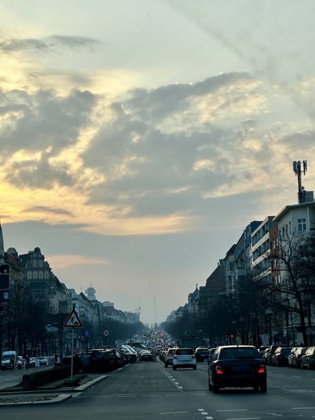 istock Busy City Street Under a Dramatic Sunset Sky 2201113706