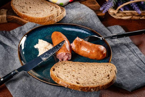 istock Cooked sausage with horseradish. 2201118429