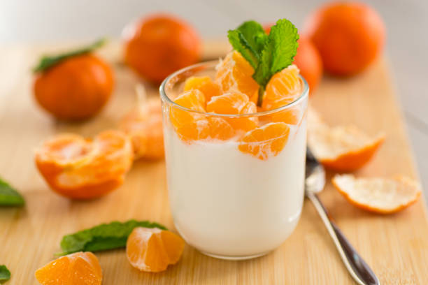 Creamy yogurt with tangerine slices.