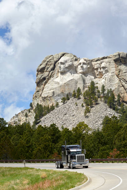 istock Mount Rushmore with Winding Road, Cloud filled sky, Black Hills, South Dakota 2201133132