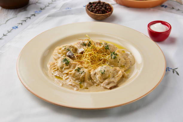 istock Creamy Mushroom Dumplings Elegant Culinary Delight with Rich Tones and Balanced Composition 2201138976