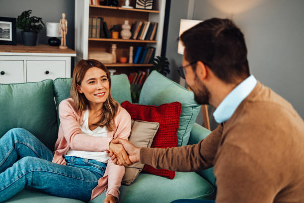 istock Young woman at psychotherapy session 2201143021
