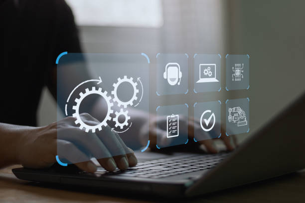 istock Robotic Process Automation (RPA) technology to automate business tasks with AI.  Digital transformation and change management. Concept with engineer setting up automated software on a laptop computer. 2201146585