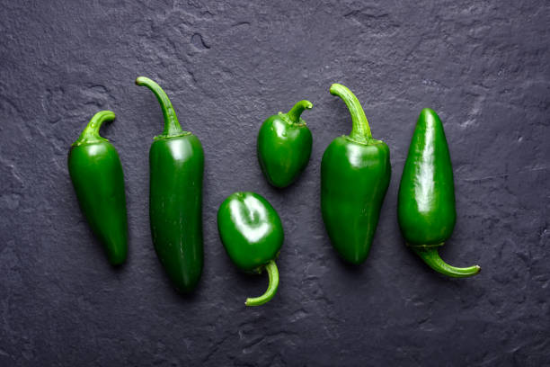 Large green peppers isolated on white background horizontal shot