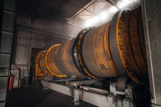 istock Industrial rotary kiln in a processing plant Large cylindrical machine for industrial processes 2201158086