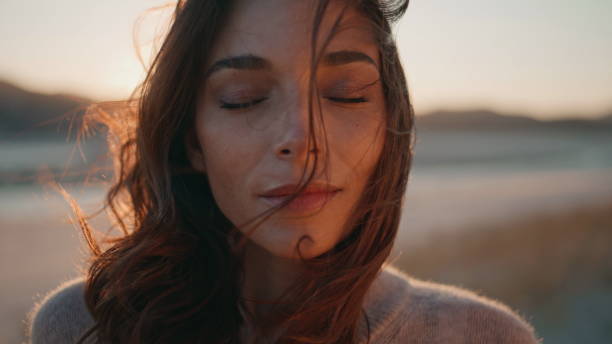 istock Portrait model relaxing sunset sunlight. Sensual woman closing eyes at evening 2201159516