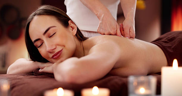 istock Relaxing shiatsu chiropractic back massage treatment by physio therapist 2201174140