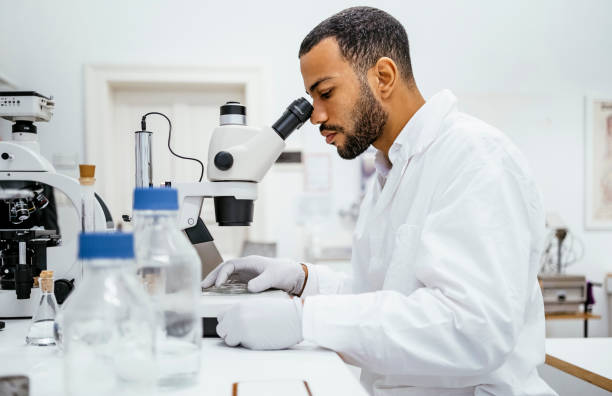 istock Confident Mixed Race Male Student Working in University Laboratory 2201176021