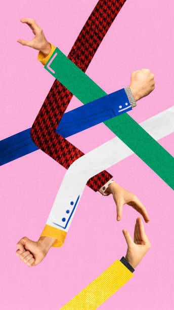 istock Intertwined arms reach for connection, showing complexity and entanglement in teamwork and collaboration. 2201176168