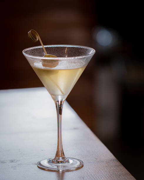 istock A classy martini glass with a green olive on top 2201177853