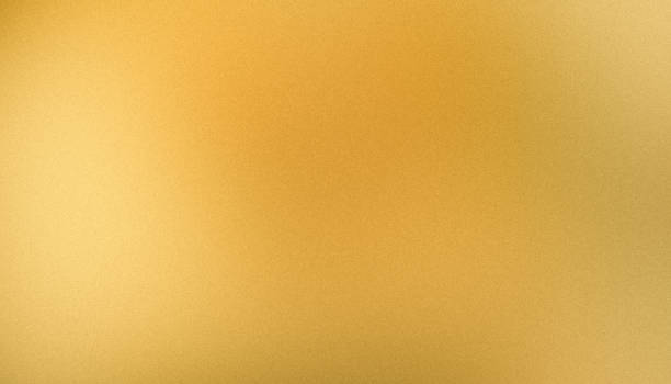 Grainy gold diffused gradient golden bronze color abstract background banner with noise