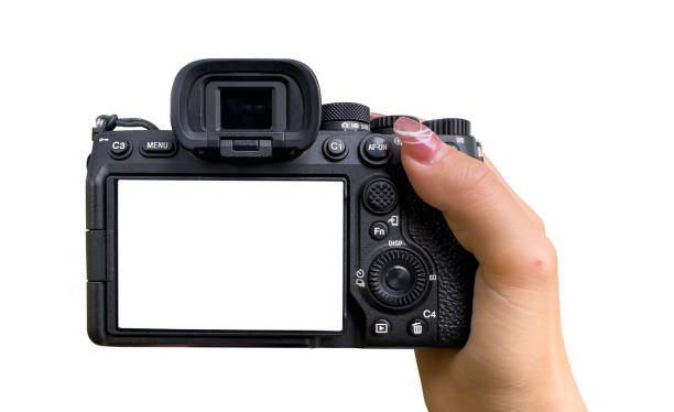 istock Hand holding Mirrorless camera with white screen isolated on white background. clipping path 2201193720