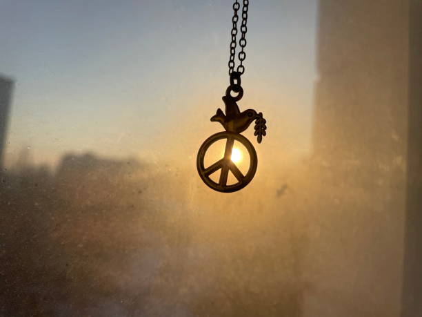 istock Symbol silhouetted against a winter sunrise 2201203471