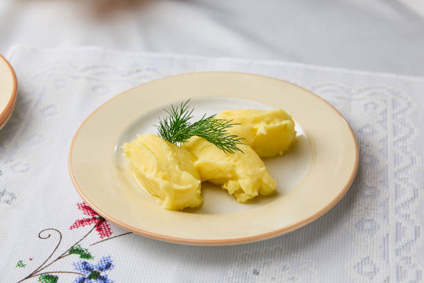 Creamy Mashed Potatoes with Dill on Elegant Plate, Soft Lighting and Subtle Color Palette