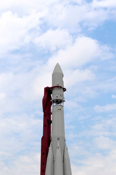 istock Against the background of the sky there is a model of a space rocket. 2201224088