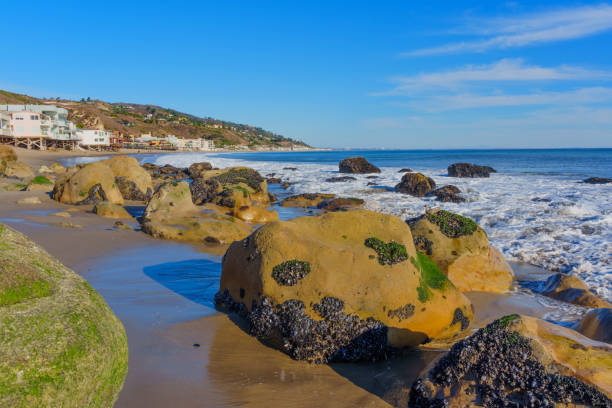 istock Rocky Malibu Beach with Coastal Homes in the Background 2201225133