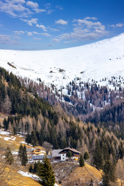 istock Rustic Cabin in Snowy Mountain Landscape 2201231430