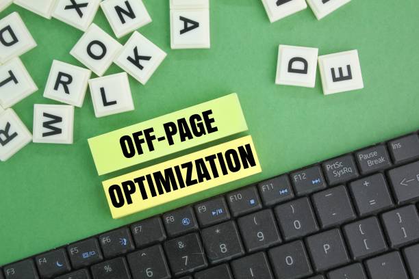 istock laptop keyboard and colored paper with the word OFF-PAGE OPTIMIZATION 2201234336