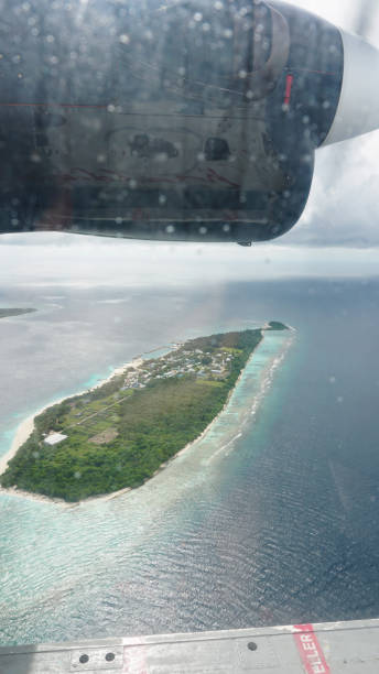 istock Flying over a tropical island in the maldives 2201235453