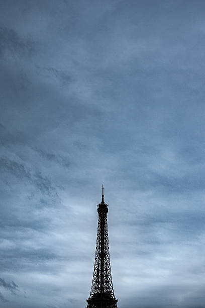 istock Famous Parisian monument and cloudy sky on background 2201241007