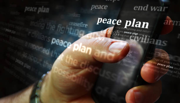 istock Peace plan sanctions news titles on screen in hand 3d illustration 2201243053