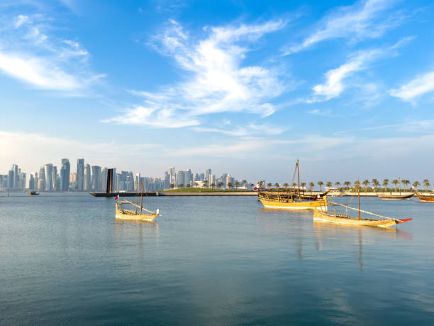 istock Doha City Center day and night 2201244532
