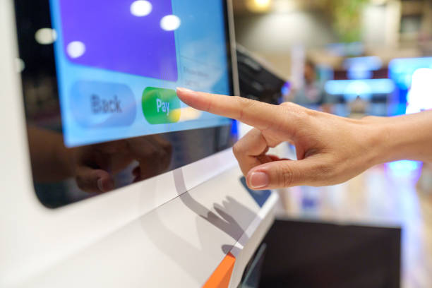 istock Confirming Payment on Self-Service Kiosk in Penang Supermarket 2201246350
