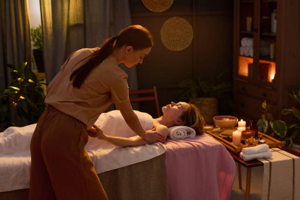 istock Blonde Woman Taking Pleasure From Professional Massage 2201247473