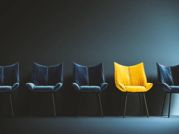 Hiring concept design. One empty yellow chair among many. One spot left.